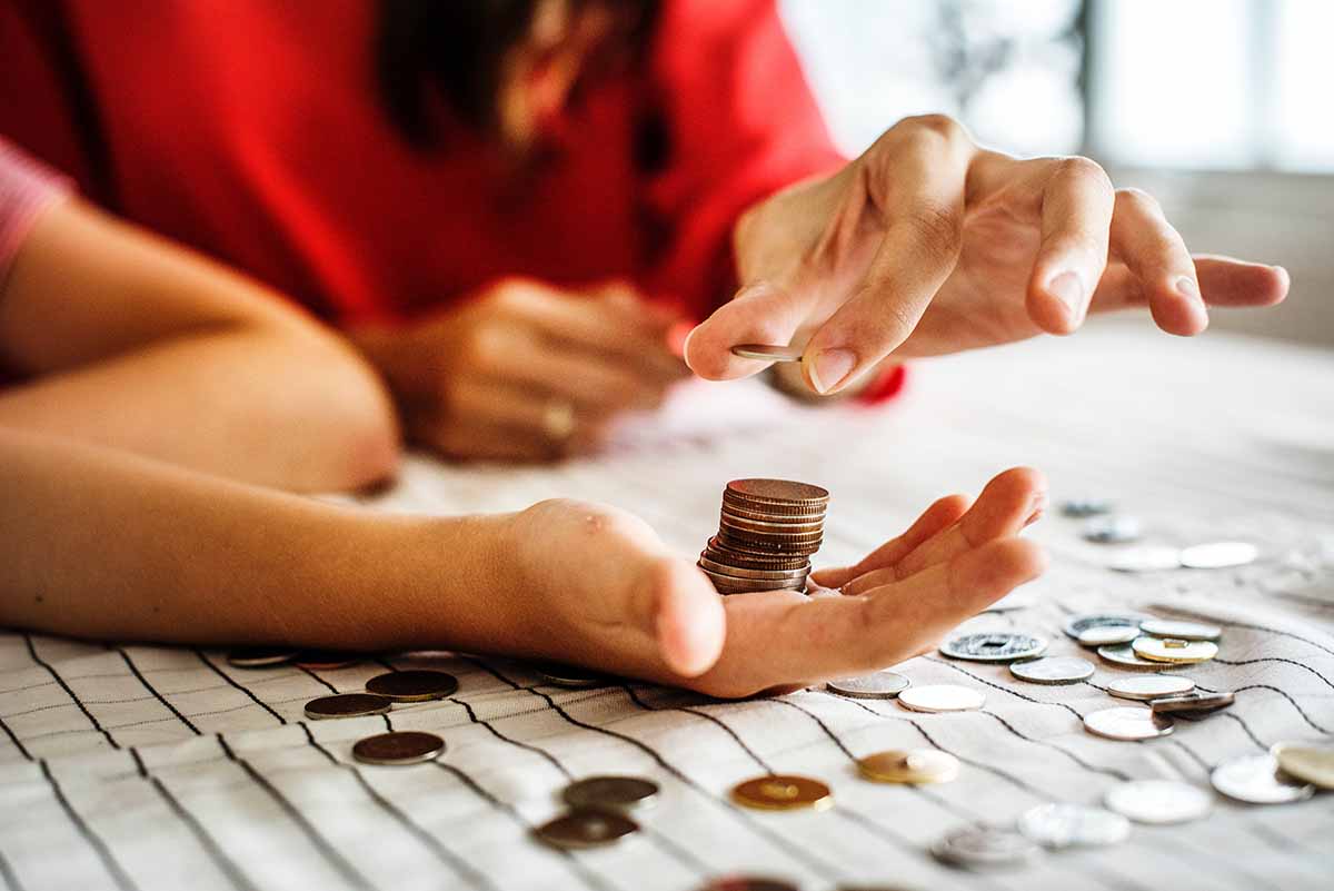 Woman counting out change